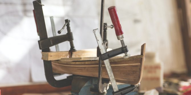 handcrafted craftwork of a wooden boat model handcrafted craftwork of a wooden boat model